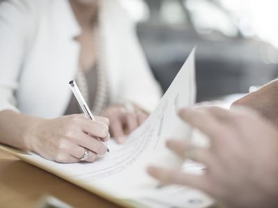 Woman Signing Contract