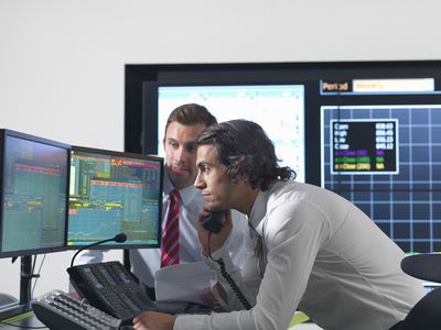 Financial Traders With Screens