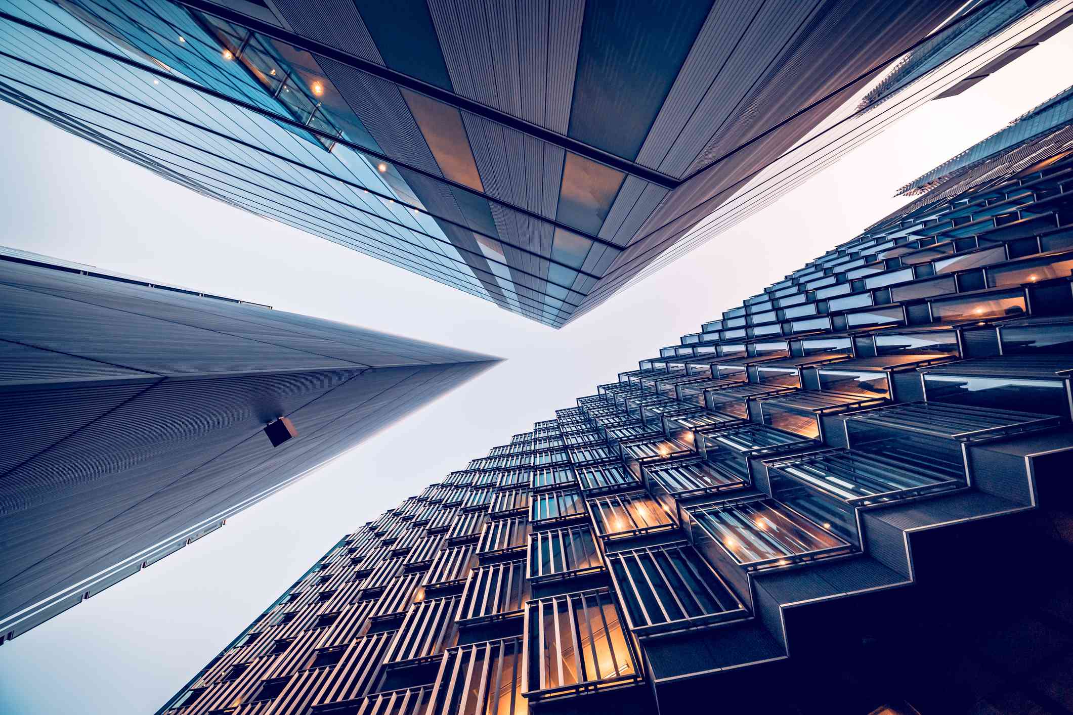 looking up at the skyscrapers in london's financial district