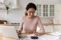 Woman tries to determine which personal loan is easiest to get approved for