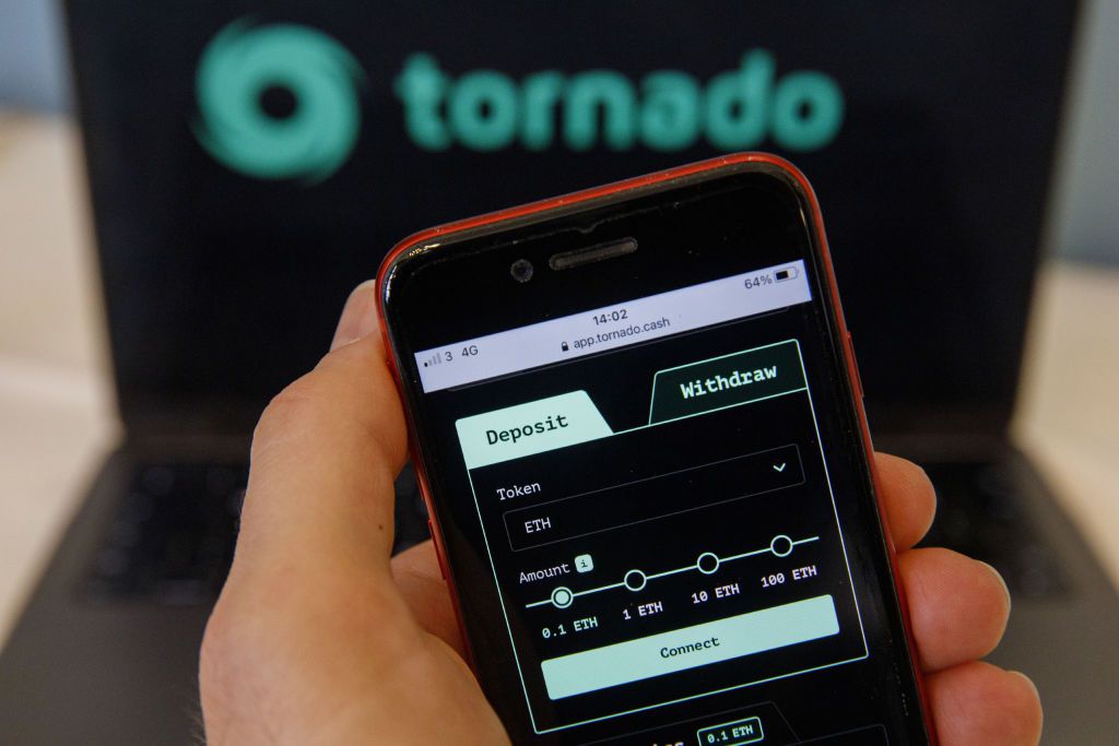 The Tornado Cash website displayed on a laptop and smartphone screen arranged in London, U.K., on Tuesday, March 15, 2022. 