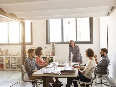 Business people talking in a modern boardroom