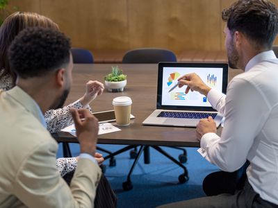 Financial advisor in conversation with clients