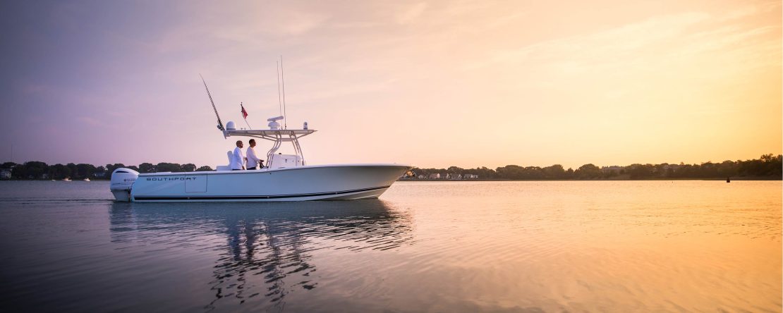 Southport Boat on calm water at sunset