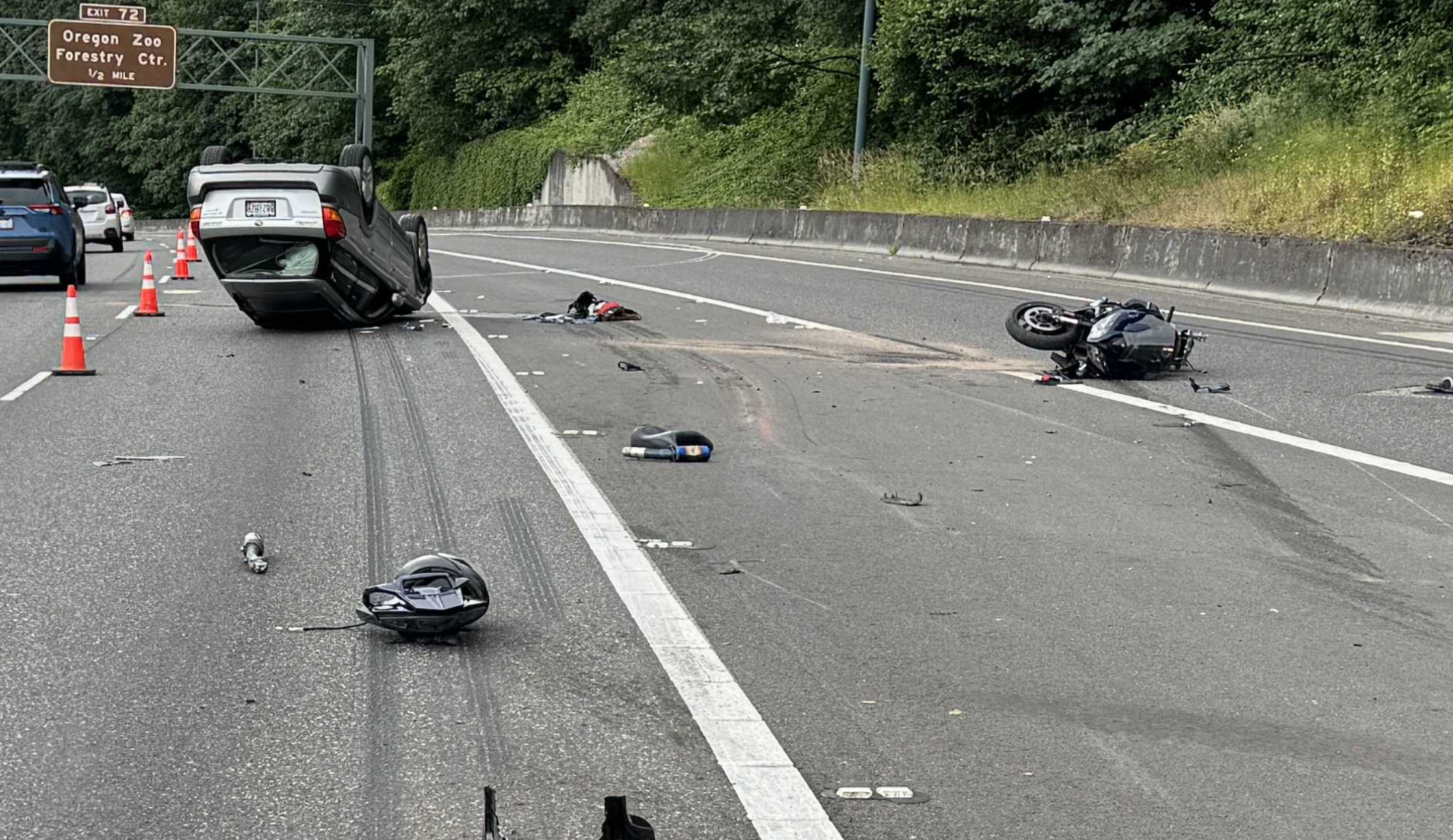 A man is facing felony assault charges after a crash caused his car to flip over on a motorcyclist on June 26, 2024. (Courtesy: PPB)