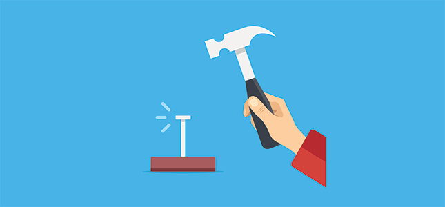 An illustration of a hand holding a hammer and driving a nail into wood