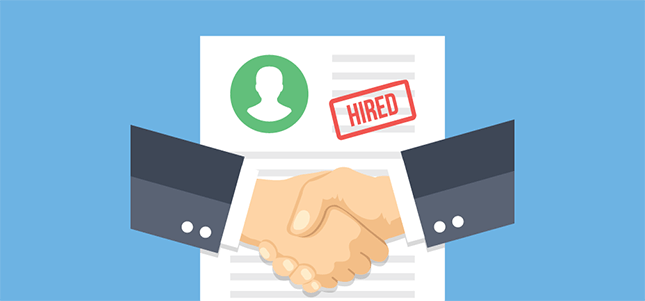 An illustration of two arms in a handshake in front of a resume with the word "hired" stamped in red.