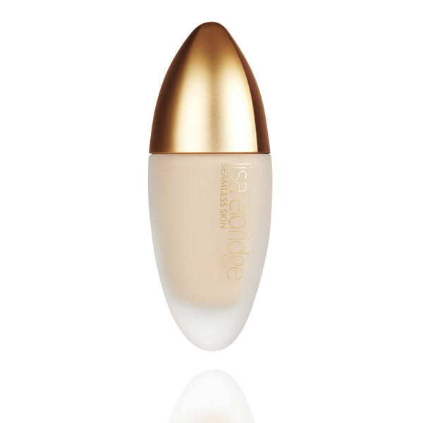 Lisa Eldridge Seamless Skin Foundation in a matte glass bottle with a gold lid.