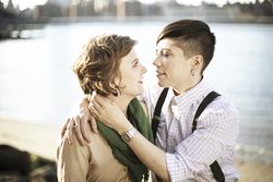 Lesbian couple embracing in Brooklyn, NY outside