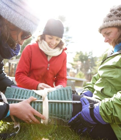 People performing wilderness first aid