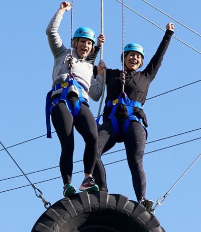 Team on the top of a ropes course