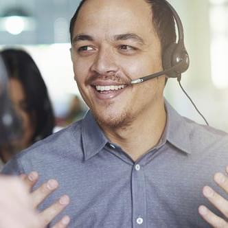 Photo of phone operator wearing a headset