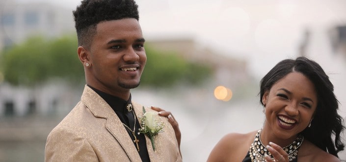 Couple in formal wear laughing together