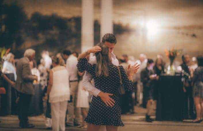 couple dancing in a crowd