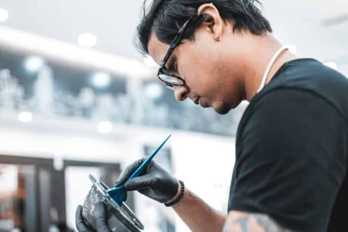 a man mixing hair dye