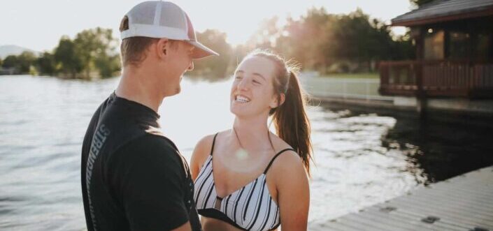 Couple Laughing By The Pool