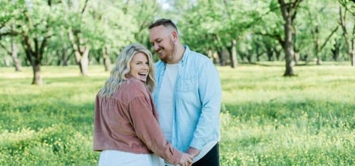 couple having fun in the field