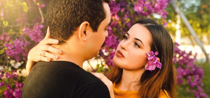 Woman looking at the mans face