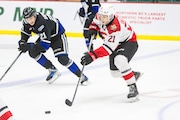 Red Wings' third-round pick Ondrej Becher (right) had a breakout season at Prince George (James Doyle)