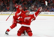 The Detroit Red Wings are still in the process of locking up left wing Lucas Raymond, right, and defenseman Moritz Seider (53) to new contracts. (AP Photo/Duane Burleson)