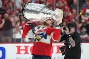 Florida Panthers right wing Vladimir Tarasenko kisses the Stanley Cup trophy after defeating the Edmonton Oilers in Game 7 of the NHL hockey Stanley Cup Final, Monday, June 24, 2024, in Sunrise, Fla. (AP Photo/Wilfredo Lee)