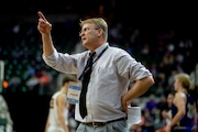 Schoolcraft head coach Randy Small points to the scoreboard as he argues with a referee during the second half of the MHSAA Division 3 boys basketball state championship game on Saturday, March 26, 2022 at the Breslin Center in East Lansing. Schoolcraft clinched the Division 3 state title with a 59-49 victory over Menominee. (Jake May | MLive.com)