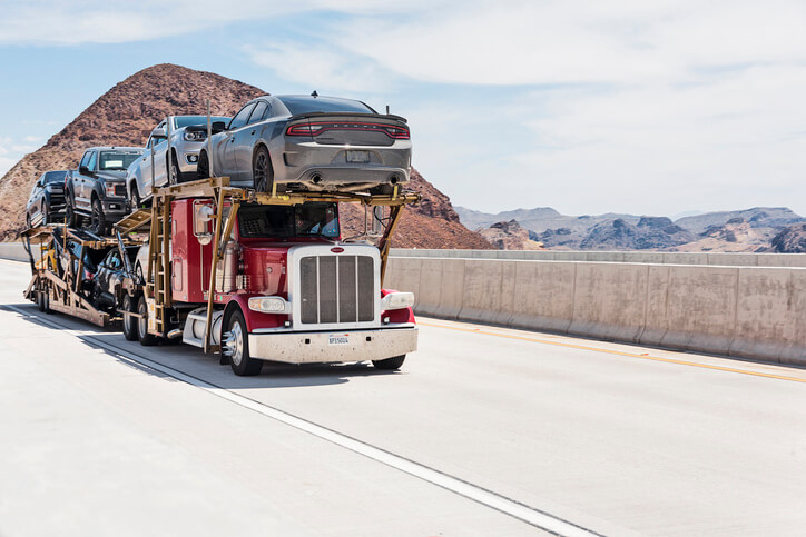 Truck shipping several cars