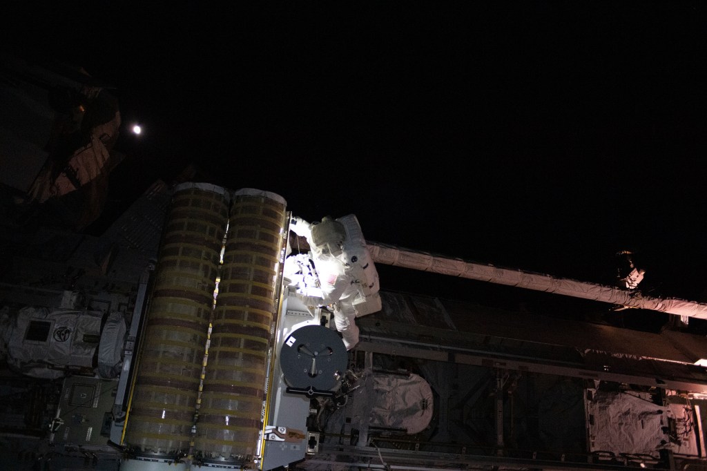 iss068e026356 (Dec. 3, 2022) --- NASA astronaut and Expedition 68 Flight Engineer Frank Rubio is pictured during a spacewalk to install a roll-out solar array on the International Space Station's Starboard-4 truss segment.