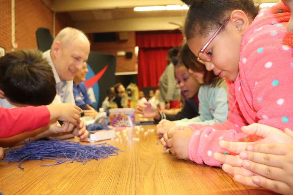 young students complete a building exercise