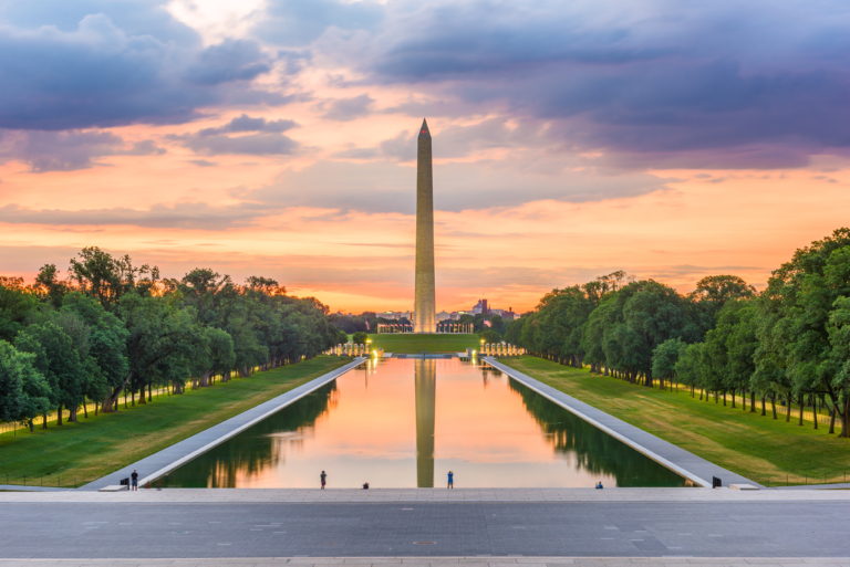 The Washington Monument in Washington, DC, reflected in the reflecting pool as seen from the steps of the Lincoln Memorial.