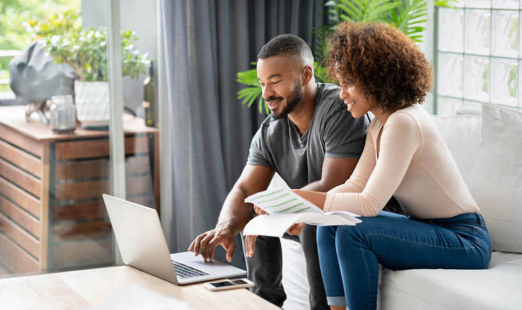 Couple working out their savings