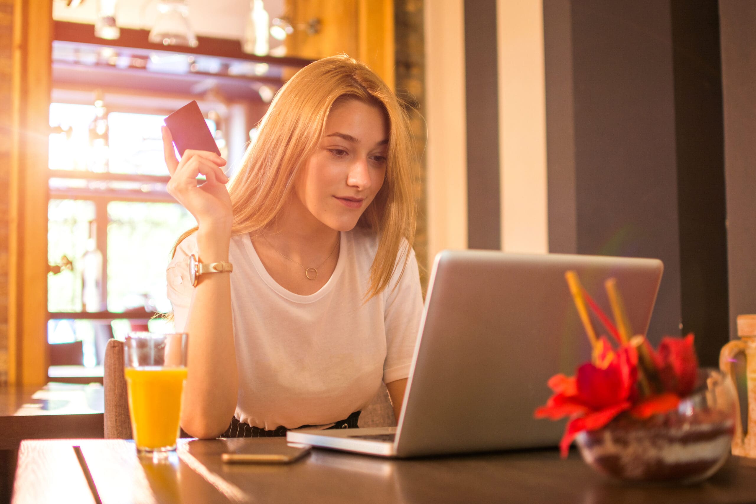 Teenage girl using laptop and shopping online.