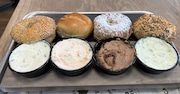 A bagel and cream cheese flight from Carlos Bagel Shop in Hawthorne.