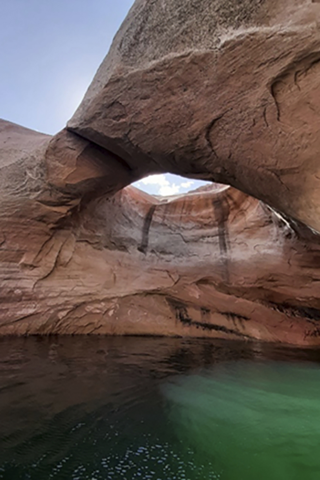 This undated photo provided by the National Park Service shows Double Arch prior to collapse in Rock Creek Bay of the Glen Canyon National Recreation Area, Utah. (National Park Service via AP)