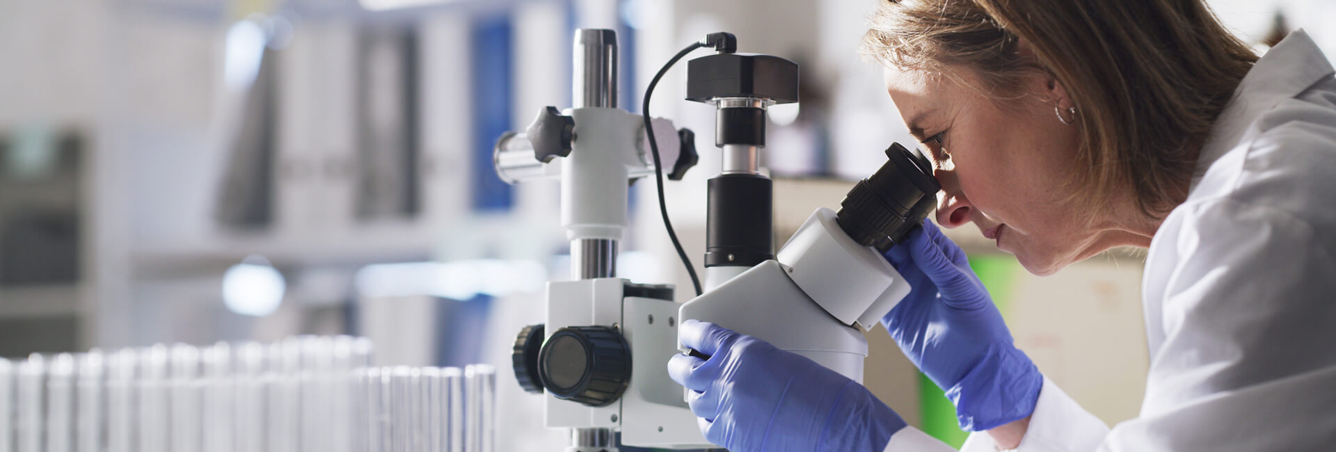 female doctor looking through medical equipment