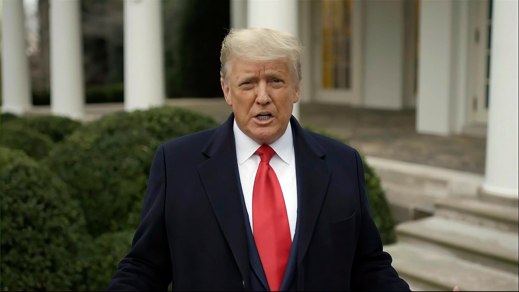 FILE - This exhibit from video released by the House Select Committee, shows President Donald Trump recording a video statement on the afternoon of Jan. 6, 2021, from the Rose Garden at the White House in Washington. Trump is making the Jan. 6, 2021 attack on the Capitol a cornerstone of his bid to return to the White House. Trump opened his first rally as the presumed Republican Party presidential nominee standing in salute with a recorded chorus of Jan. 6 prisoners singing the national anthem. (House Select Committee via AP)