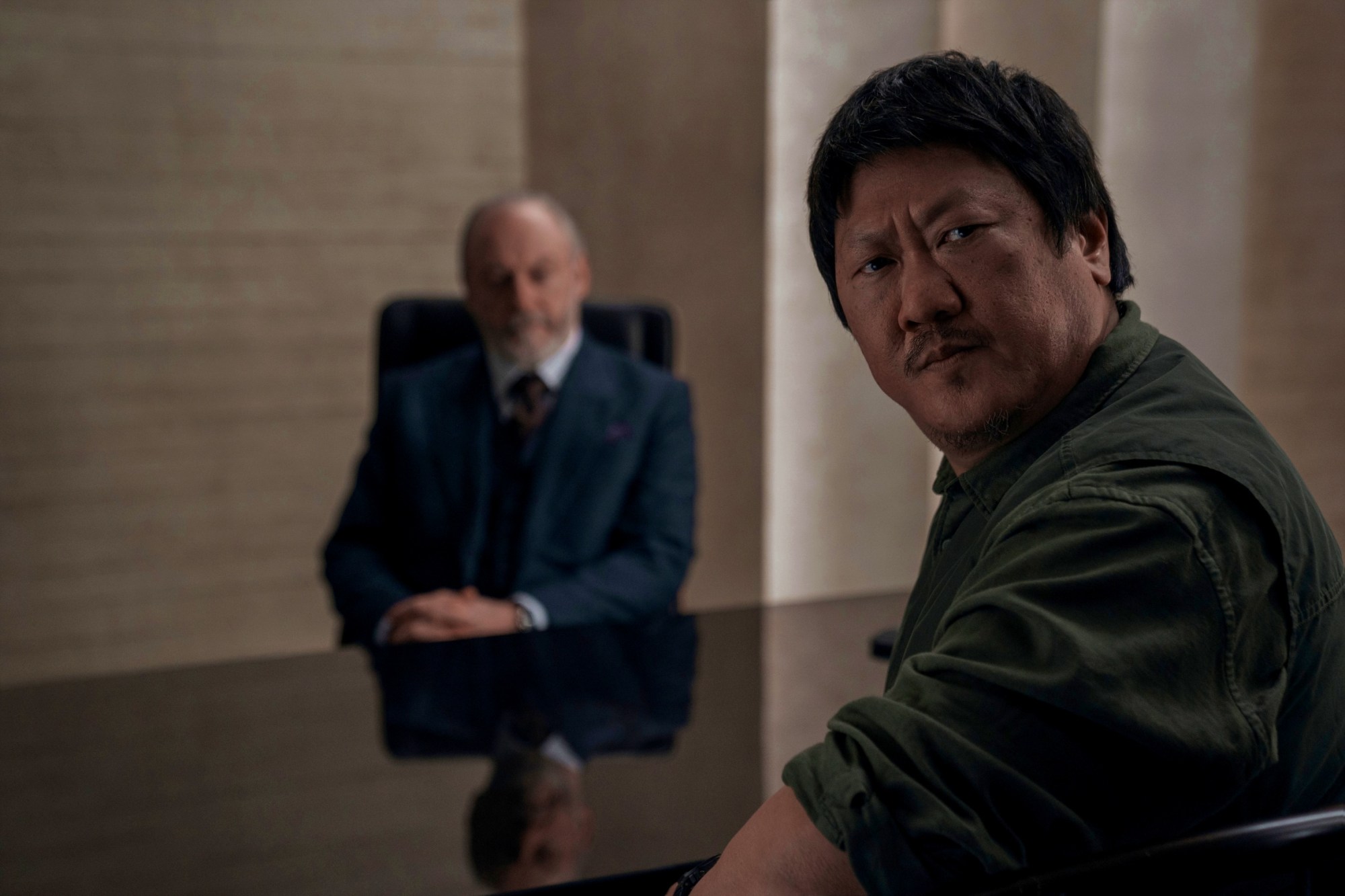 Liam Cunningham, left, and Benedict Wong, share a scene in "3 Body Problem." (Courtesy of Netflix)