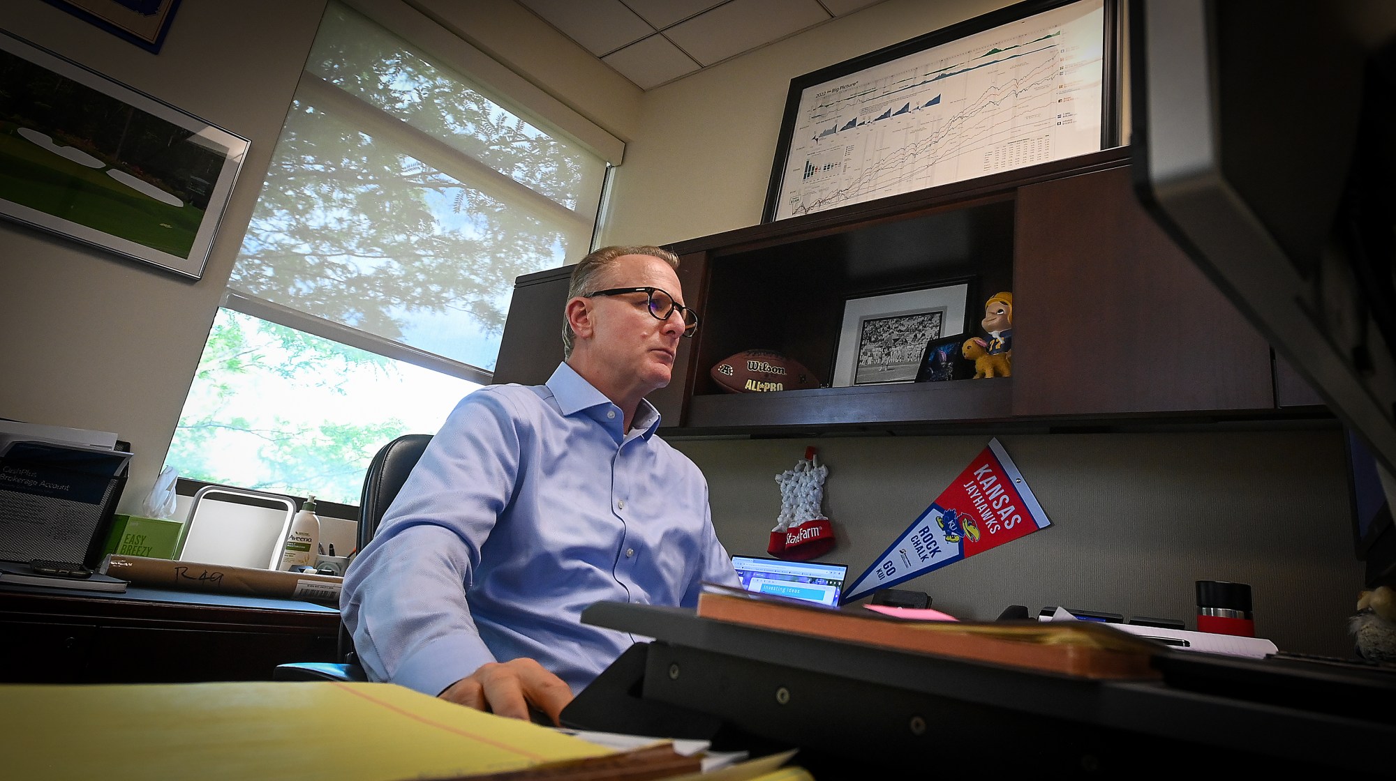 Craig Moddelmog of Windsor, works in his Loveland office on June 18, 2024. Moddelmog continues to struggle with symptoms of long Covid for three and a half years.(Jim Rydbom/Staff Photographer)