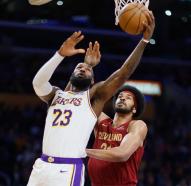 LeBron James, who agreed to a $104 million contract to stay with the Lakers, puts up a shot against Cleveland's Jarrett Allen on April 6. (Allen J. Schaben/Los Angeles Times)