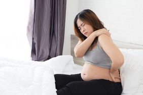 Pregnant women suffering from pain in shoulder and back