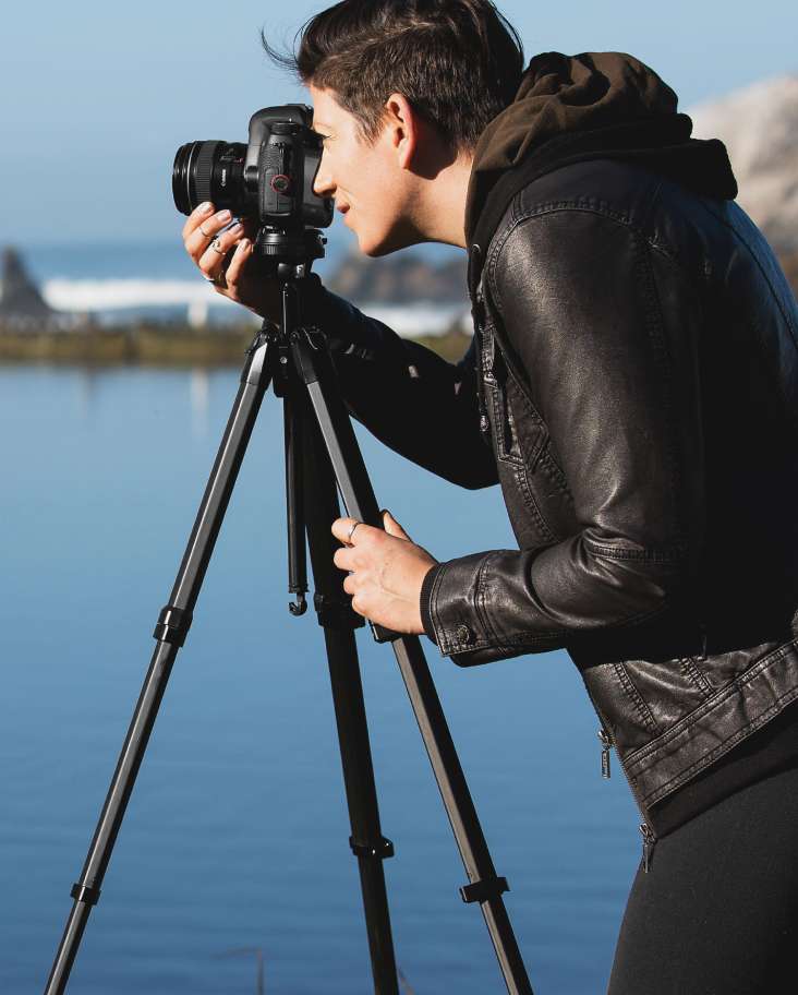 Man using tripod while capturing