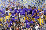 As the confetti flies, LSU players celebrate their SEC Championship Game win against Georgia at Mercedes-Benz Stadium on Dec. 7, 2019, in Atlanta, Ga. LSU won 37-10. Courtesy Bill Feig/The Advocate