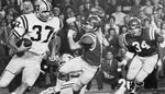 Tommy Casanova turns the corner on a 74-yard punt return for a touchdown on Dec. 5, 1970, against Ole Miss in Tiger Stadium. The Times-Picayune