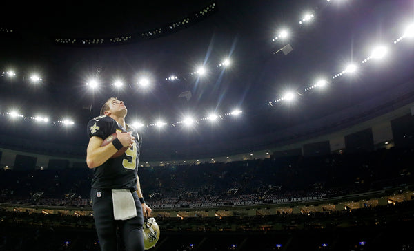 Drew Brees runs off the field in the Superdome after the Saints beat the Tampa Bay Buccaneers 31-24 on  Dec. 24, 2016. David Grunfeld / The Times-Picayune | The Advocate