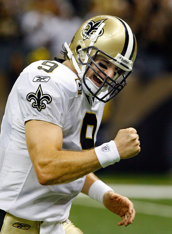 Drew Brees celebrates after throwing his sixth touchdown pass against the Detroit Lions at the Superdome on Sept. 13, 2009. Chuck Cook / The Times-Picayune | The Advocate