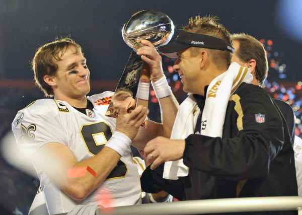 New Orleans Saints quarterback Drew Brees (9) celebrates with New Orleans head coach Sean Payton after Super Bowl XLIV in Miami Gardens, Fla., Feb. 7, 2010.  The Saints won 31-17. Bill Feig / The Advocate