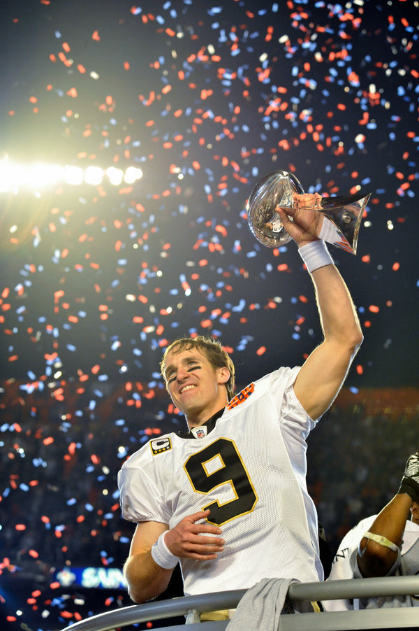 New Orleans Saints quarterback Drew Brees (9) celebrates after Super Bowl XLIV in Miami Gardens, Fla., Feb. 7, 2010. Bill Feig / The Advocate