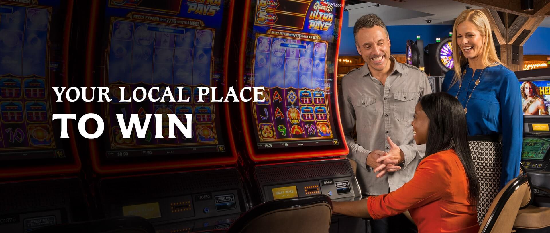 Your local place to win - three friends playing on a slot machine