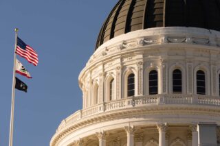 photo - Flags Fly at California's Capital Building