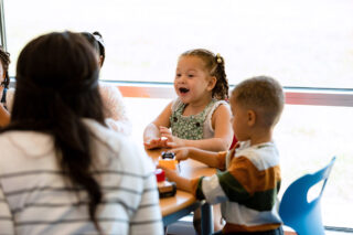 photo - Preschool Age Children Interact with Teacher